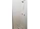 Shower featuring white tiled walls, a pebble floor and sleek fixtures at 835 E 24Th Ave # 111, New Smyrna Beach, FL 32169