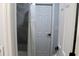 Bathroom featuring a white door and grey shower with curtain at 855 Sugar House Dr, Port Orange, FL 32129