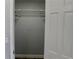 Walk-in closet features shelving and a fresh coat of paint at 855 Sugar House Dr, Port Orange, FL 32129