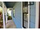 Lovely home featuring a covered porch, window, and walkway at 855 Sugar House Dr, Port Orange, FL 32129