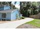 Charming home showcasing a driveway and tidy landscaping at 855 Sugar House Dr, Port Orange, FL 32129