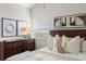 Bedroom displays a well-lit space, pleasant decor, and a neat, inviting aesthetic at 898 Baybreeze Way # 880, New Smyrna Beach, FL 32169