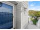 Welcoming entryway with blue door, offers curb appeal at 898 Baybreeze Way # 880, New Smyrna Beach, FL 32169