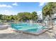 Community pool and lounge area offer a relaxing outdoor space at 898 Baybreeze Way # 880, New Smyrna Beach, FL 32169