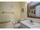Cozy bathroom with a single sink vanity and retro shower curtain at 112 Lagoon Ct, New Smyrna Beach, FL 32169