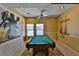 Recreation room featuring a pool table and mural art at 112 Lagoon Ct, New Smyrna Beach, FL 32169