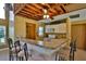 Kitchen featuring white cabinets, breakfast bar, ceiling fan and laminate counters at 112 Lagoon Ct, New Smyrna Beach, FL 32169