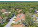 Overhead shot of townhomes with private driveways and natural landscaping at 210 Pine Cone Trl, Ormond Beach, FL 32174