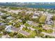 Aerial view of residential neighborhood with water views and beautiful trees at 312 Jefferson Ave, Port Orange, FL 32127