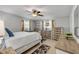 Inviting bedroom with neutral colors, natural light, and wood-look flooring at 312 Jefferson Ave, Port Orange, FL 32127