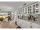 Bright, airy kitchen with ample counter space, white cabinetry, and modern appliances at 312 Jefferson Ave, Port Orange, FL 32127