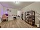 Bedroom featuring neutral walls, laminate floors, and a gaming station at 465 White Cotton Cir, Oviedo, FL 32765