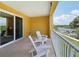 This condo has a relaxing balcony with beautiful views of boats docked in the bay and other scenery at 7 Riverwalk Dr # 206, New Smyrna Beach, FL 32169
