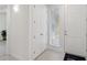 Clean, bright entryway featuring neutral colors, closet, and a window at 7 Riverwalk Dr # 206, New Smyrna Beach, FL 32169