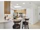Well-equipped kitchen with breakfast bar and stainless steel appliances, perfect for entertaining at 7 Riverwalk Dr # 206, New Smyrna Beach, FL 32169