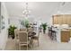 Inviting living space with open layout, featuring dining area, living room and kitchen with bar seating at 7 Riverwalk Dr # 206, New Smyrna Beach, FL 32169