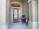 Inviting front porch with tile flooring and seating area at 1077 Crystal Creek Dr, Port Orange, FL 32128