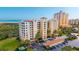 Coastal condominium showcasing architecture, nearby beach, and private balconies with serene neighborhood view at 261 Minorca Beach Way # 406, New Smyrna Beach, FL 32169