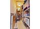 Large storage room with shelving units and plenty of space for all your storage needs at 261 Minorca Beach Way # 406, New Smyrna Beach, FL 32169