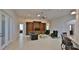 Spacious living room with tile flooring, built-in shelving, and comfortable seating at 2904 Palma Ln, New Smyrna Beach, FL 32168