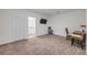 Large bedroom with carpet, closet, desk, and an ensuite bathroom at 2921 India Palm Dr, Edgewater, FL 32141