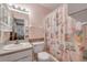 Charming bathroom featuring a flamingo-themed shower curtain and classic fixtures at 3522 Forest Branch Dr # B, Port Orange, FL 32129