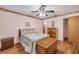 Cozy bedroom featuring ceiling fan, wood floors and natural light at 3522 Forest Branch Dr # B, Port Orange, FL 32129