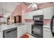 Bright kitchen features stainless steel sink and modern appliances at 3522 Forest Branch Dr # B, Port Orange, FL 32129
