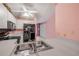 Bright kitchen with stainless steel sink, white counters and modern appliances at 3522 Forest Branch Dr # B, Port Orange, FL 32129
