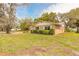 Lovely single-story home with well-manicured landscaping and a serene, tree-lined setting at 3635 Scott St, Port Orange, FL 32129