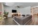 Spacious living room with hardwood floors, ceiling fan, and neutral décor at 532 White Coral Ln, New Smyrna Beach, FL 32168