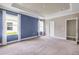 Spacious bedroom boasts natural light from windows, and a tray ceiling with recessed lighting at 1012 Bradford Ridge Dr, Leesburg, FL 34748