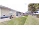 Spacious backyard with lush green grass, ideal for outdoor activities and entertaining at 106 Tuscany Villas Dr # 0160, Edgewater, FL 32141