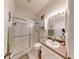 Bright bathroom with glass shower, white vanity, and decorative accents for a clean aesthetic at 106 Tuscany Villas Dr # 0160, Edgewater, FL 32141