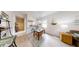 Open concept living space featuring dining area, kitchen, hallway and cozy furnishings at 106 Tuscany Villas Dr # 0160, Edgewater, FL 32141