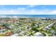 Gorgeous aerial shot of a lovely neighborhood near the beach with blue skies and a beautiful skyline at 121 Ellicott Dr, Ormond Beach, FL 32176