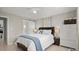 Comfortable bedroom features a serene atmosphere and access to an ensuite bathroom at 121 Ellicott Dr, Ormond Beach, FL 32176