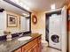Updated bathroom features modern vanity, beautiful countertop, and a stackable washer/dryer at 133 Cedar Dunes Dr, New Smyrna Beach, FL 32169