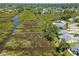 Gorgeous aerial view of a home with backyard dock access and lush surrounding marsh at 1363 Wayne Ave, New Smyrna Beach, FL 32168
