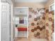 View from a bathroom leading to a bedroom with a floral bedspread at 1363 Wayne Ave, New Smyrna Beach, FL 32168