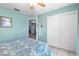 Comfortable bedroom with closet and tile floor, offering a clean and simple design at 1363 Wayne Ave, New Smyrna Beach, FL 32168