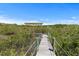 Picturesque dock with a gazebo and beautiful surroundings at 1363 Wayne Ave, New Smyrna Beach, FL 32168