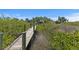 Charming home with a waterside dock leading to the property at 1363 Wayne Ave, New Smyrna Beach, FL 32168
