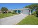 Lovely single-Gathering home with attractive exterior, well-maintained lawn, and a two-car garage at 1363 Wayne Ave, New Smyrna Beach, FL 32168