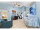 Living room featuring tile flooring, coastal decor, and a seamless flow to other spaces in this home at 1363 Wayne Ave, New Smyrna Beach, FL 32168