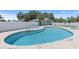 Resort-style pool offering a relaxing retreat, with lounge chairs and a covered cabana area at 1363 Wayne Ave, New Smyrna Beach, FL 32168