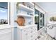 Additional kitchen view featuring a prep area, ocean view, decor, and a pass-through to the living area at 1373 N Atlantic Ave, New Smyrna Beach, FL 32169