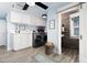 Well-equipped laundry room with modern appliances, ample storage, and stylish decor, making chores a breeze at 1373 N Atlantic Ave, New Smyrna Beach, FL 32169