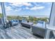 Stylish outdoor seating area with ocean views, perfect for relaxing and enjoying the coastal scenery at 1373 N Atlantic Ave, New Smyrna Beach, FL 32169