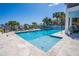 Inviting pool with shallow area, spa, and comfortable lounge seating for relaxation at 1373 N Atlantic Ave, New Smyrna Beach, FL 32169